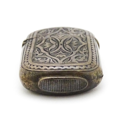 281 - A Victorian silver vesta case with engraved decoration. Maker Hillard & Thomason 1 1/2