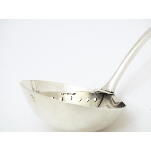 293 - A silver sauce ladle with central strainer section marked with Pat no 296612. ( Possibly for mint sa... 