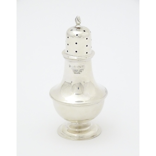 294 - A silver pepperette hallmarked Birmingham, 1913 maker William Aitken and stamped with retailers deta... 