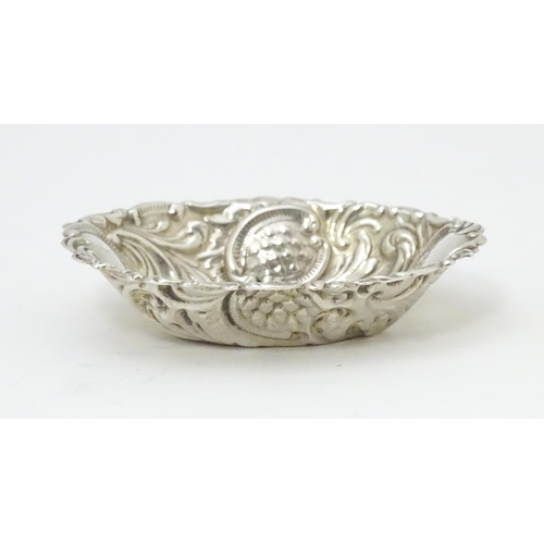 300 - A small silver bonbon dish of oval form, hallmarked Birmingham 2002 with Elizabeth II Golden Jubilee... 