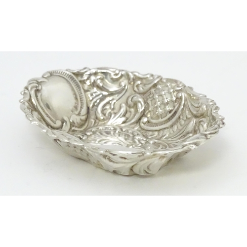 300 - A small silver bonbon dish of oval form, hallmarked Birmingham 2002 with Elizabeth II Golden Jubilee... 