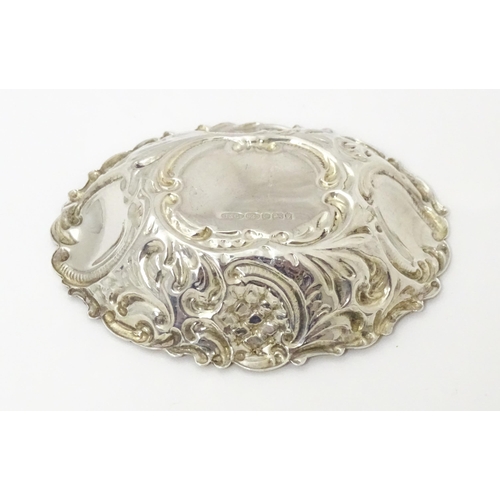 300 - A small silver bonbon dish of oval form, hallmarked Birmingham 2002 with Elizabeth II Golden Jubilee... 