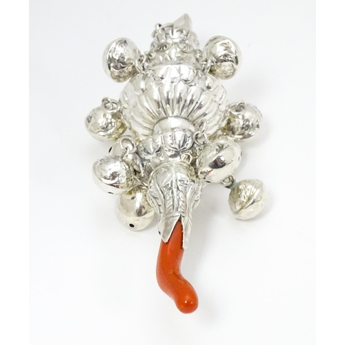 301 - A .925 silver baby's rattle with ten bells and coral branch. Approx 5