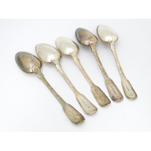 307 - Five assorted 19thC silver Fiddle pattern dessert spoons comprising two hallmarked London 1820 maker... 