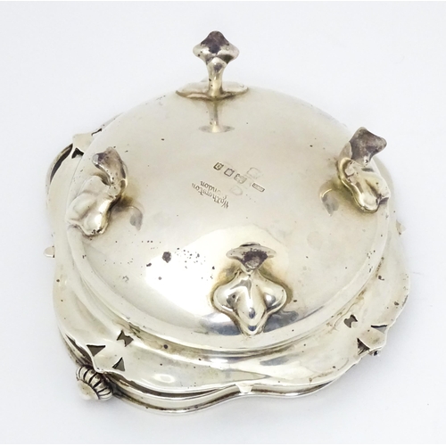 312 - A silver bonbon dish with swing handle hallmarked London 1919 maker E.A.D and stamped Watherston Lon... 