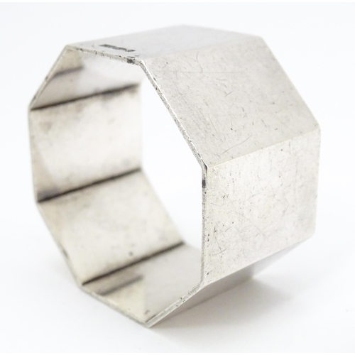 325 - A silver napkin ring of octagonal form