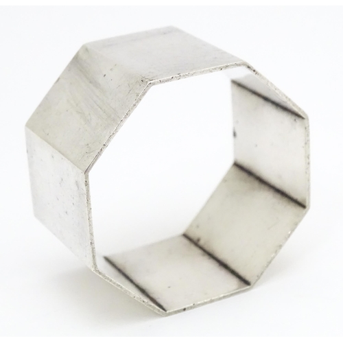 325 - A silver napkin ring of octagonal form