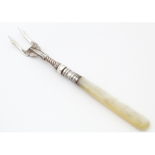 326 - A silver pickle fork with mother of pearl handle, hallmarked Birmingham 1915 maker William Devenport... 