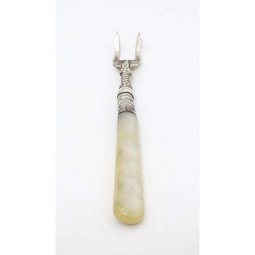 326 - A silver pickle fork with mother of pearl handle, hallmarked Birmingham 1915 maker William Devenport... 