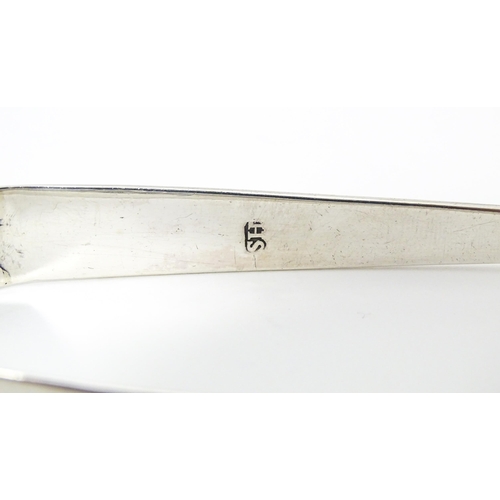 329 - Silver Old English pattern sugar tongs hallmarked London 1799 maker Solomon Hougham. Approx. 5 1/2