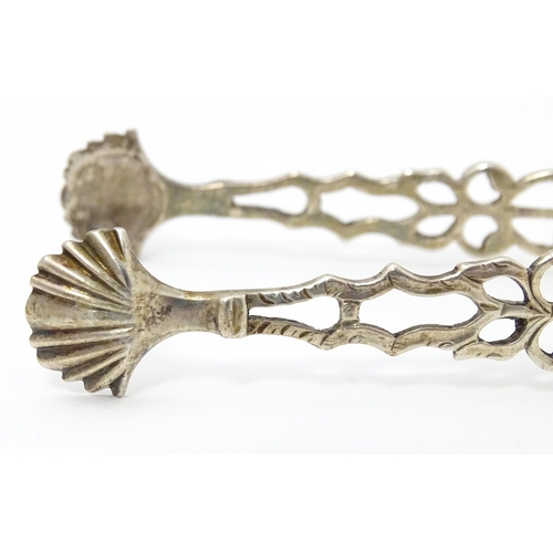 332 - 18thC Silver sugar tongs with shell formed grips. maker Philip Batchelor