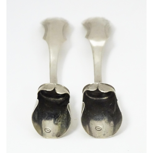 333 - A pair of Dutch silver small spoons with shovel formed bowls. Approx 3 1/4