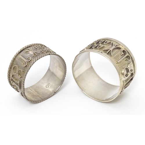 334 - Two Continental silver napkin rings  both decorated with astrological symbols. One with rope twist s... 