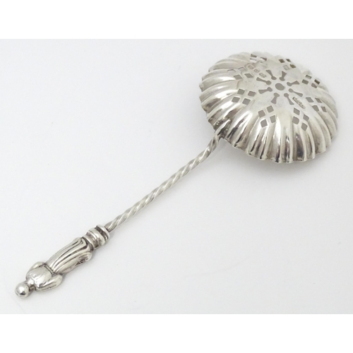 341 - A Victorian silver sifter spoon with apostle detail to handle. Hallmarked Birmingham 1895 maker Will... 