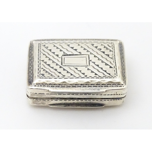 342 - A Geo III silver vinaigrette with gilded interior and pierced grille. Hallmarked Birmingham 1825 mak... 