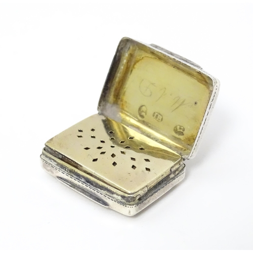 342 - A Geo III silver vinaigrette with gilded interior and pierced grille. Hallmarked Birmingham 1825 mak... 