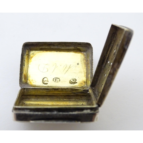 342 - A Geo III silver vinaigrette with gilded interior and pierced grille. Hallmarked Birmingham 1825 mak... 