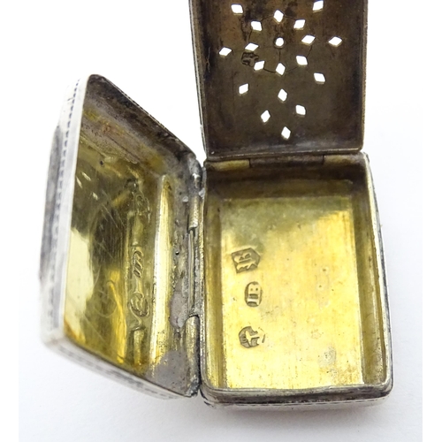 342 - A Geo III silver vinaigrette with gilded interior and pierced grille. Hallmarked Birmingham 1825 mak... 