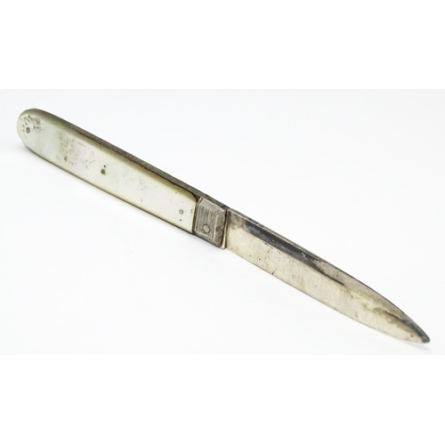 345 - A 19thC silver folding fruit knife with mother of pearl handle. Hallmarked Sheffield 1833 maker Nath... 