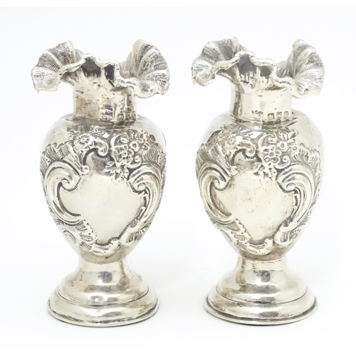 354 - A pair of Victorian silver vases with flared rims, hallmarked Chester 1898 maker James Deakin & Sons... 