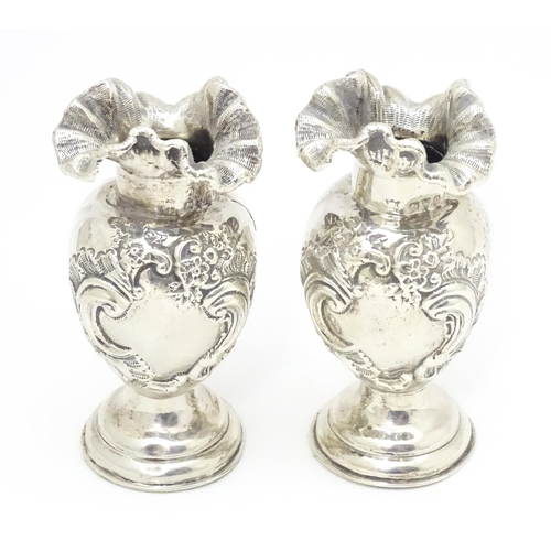 354 - A pair of Victorian silver vases with flared rims, hallmarked Chester 1898 maker James Deakin & Sons... 