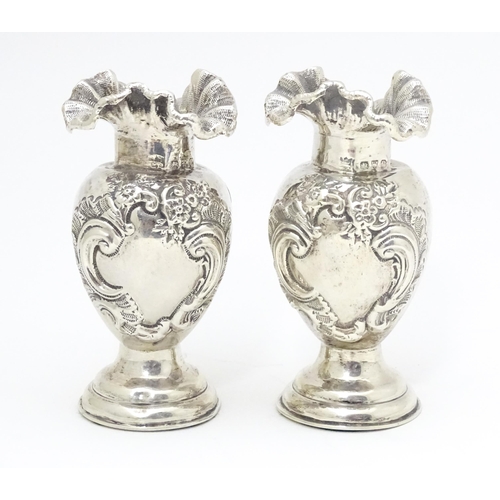 354 - A pair of Victorian silver vases with flared rims, hallmarked Chester 1898 maker James Deakin & Sons... 