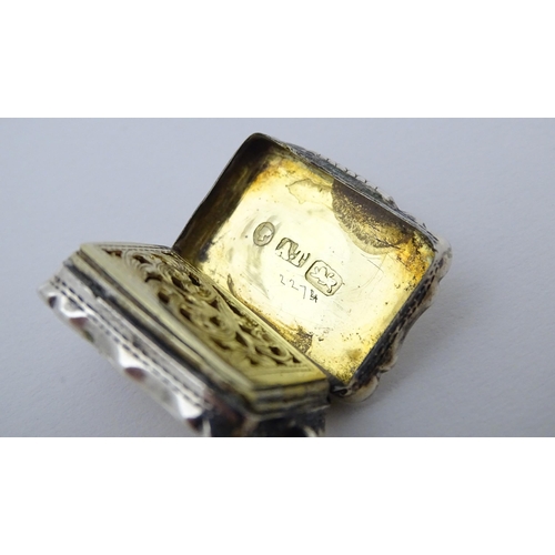 357 - A Victorian silver vinaigrette with engraved decoration and gilded interior. hallmarked Birmingham 1... 