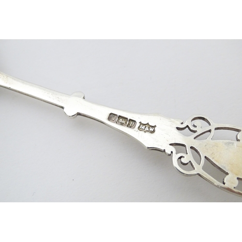 359 - A silver spoon with engraved decoration and open work to handle.  Hallmarked Sheffield 1912 maker Ma... 