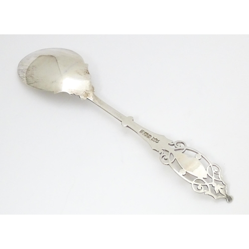 359 - A silver spoon with engraved decoration and open work to handle.  Hallmarked Sheffield 1912 maker Ma... 