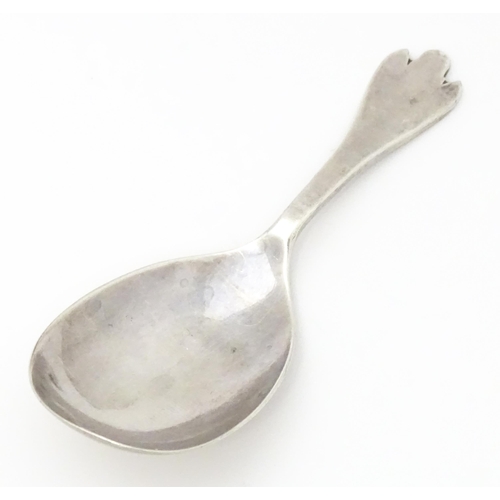 360 - A silver caddy spoon with trefid formed handle. Hallmarked Sheffield 1966 maker Francis Howard Ltd. ... 