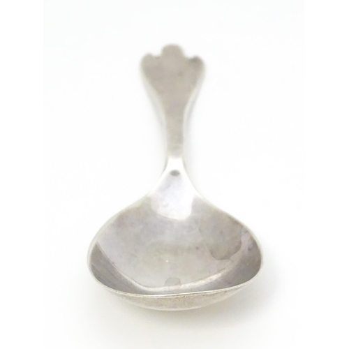 360 - A silver caddy spoon with trefid formed handle. Hallmarked Sheffield 1966 maker Francis Howard Ltd. ... 