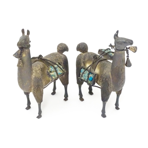 365 - A pair of silver llama figures marked under .950 Possibly Peruvian 3 1/2