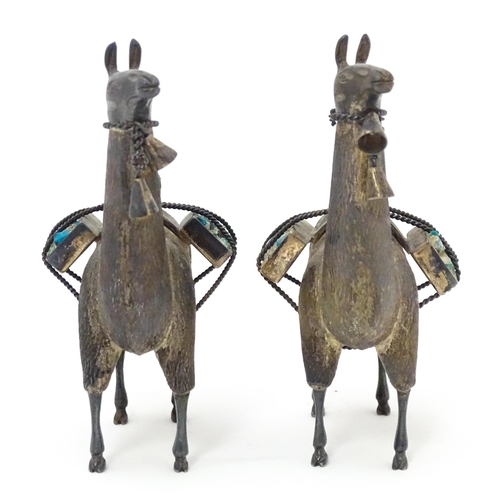 365 - A pair of silver llama figures marked under .950 Possibly Peruvian 3 1/2