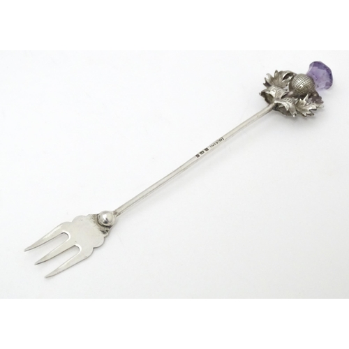 367 - A silver pickle fork with thistle detail to handle, hallmarked Birmingham 1908 maker CM & Co. Approx... 