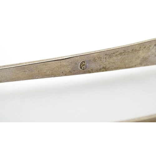 368 - Early 19thC silver sugar tongs hallmarked Newcastle maker Dorothy Langland. Approx 5 1/2