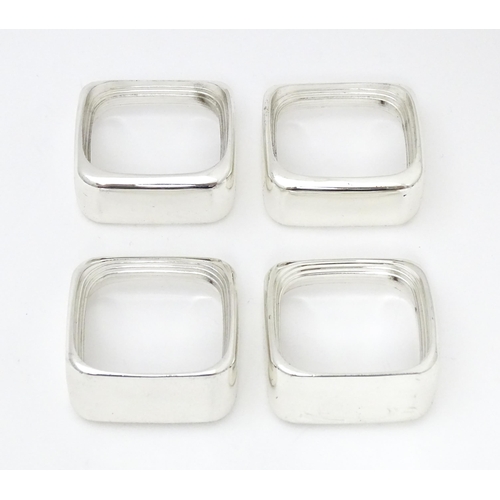 387 - A set of four 'capri' pattern silver plate napkin rings. Produced for Wedgwood.