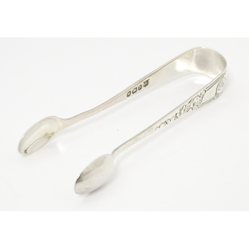 419 - Silver sugar tongs with engraved decoration, hallmarked Sheffield 1896, maker James Deakin & Sons. A... 