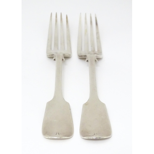 518 - A pair of Victorian silver Fiddle pattern table forks, hallmarked London 1892, maker Francis Higgins... 