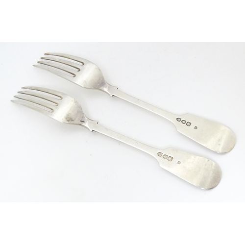 518 - A pair of Victorian silver Fiddle pattern table forks, hallmarked London 1892, maker Francis Higgins... 