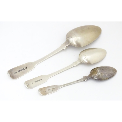 519 - Three assorted silver Fiddle pattern spoons to include a dessert hallmarked London 1826, Benjamin Da... 