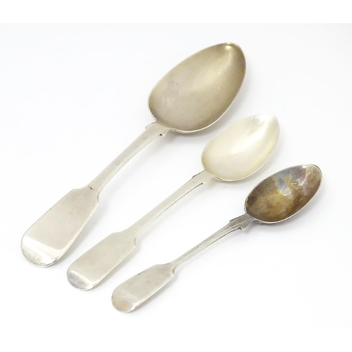 519 - Three assorted silver Fiddle pattern spoons to include a dessert hallmarked London 1826, Benjamin Da... 