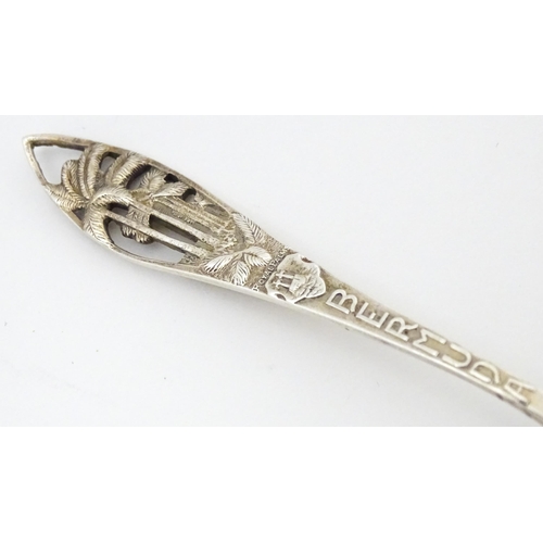 523 - A commemorative silver gilt spoon, the handle surmounted by image of Queen Alexandra, hallmarked She... 