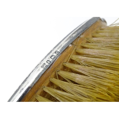 525 - An Art Deco silver backed hair brush with engine turned decoration hallmarked Birmingham 1927, maker... 