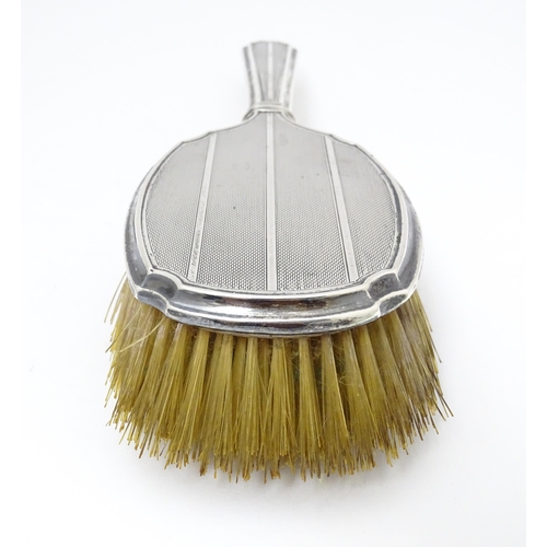 525 - An Art Deco silver backed hair brush with engine turned decoration hallmarked Birmingham 1927, maker... 