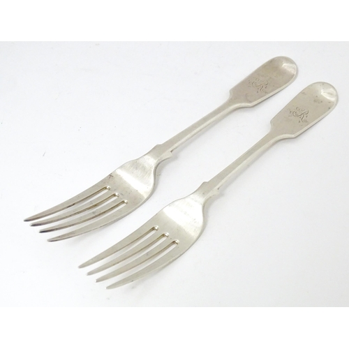 529 - A pair of Victorian silver Fiddle pattern dessert forks hallmarked London 1870, maker Henry Holland.... 