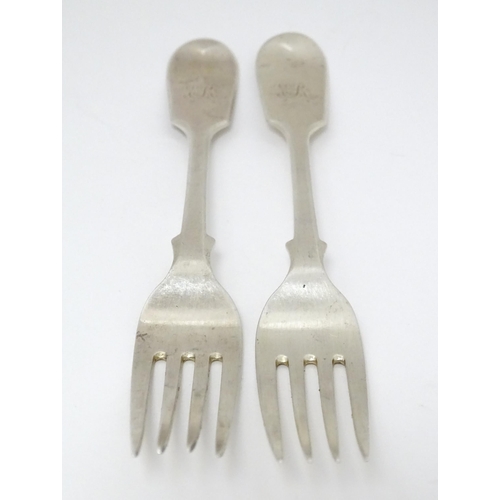 529 - A pair of Victorian silver Fiddle pattern dessert forks hallmarked London 1870, maker Henry Holland.... 