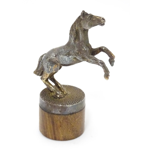 531 - A silver model of a rearing horse / pony, hallmarked London 1978, maker Stuart Devlin. Approx. 3 1/4... 