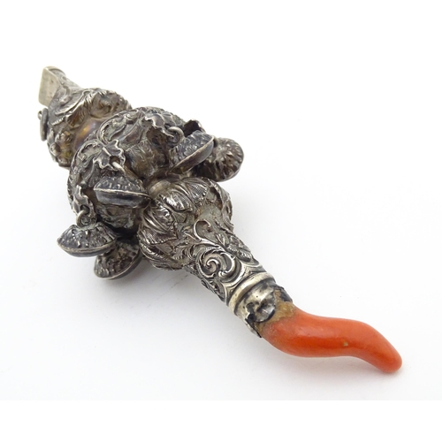 535 - A Victorian silver child's / baby's rattle with whistle to one end, and coral teether to the other, ... 