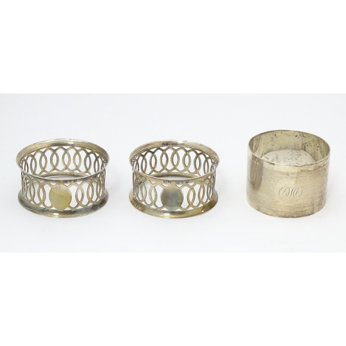 536 - A pair of silver napkin rings with openwork decoration hallmarked Chester 1912, maker M & J. Togethe... 