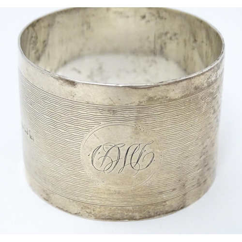 536 - A pair of silver napkin rings with openwork decoration hallmarked Chester 1912, maker M & J. Togethe... 